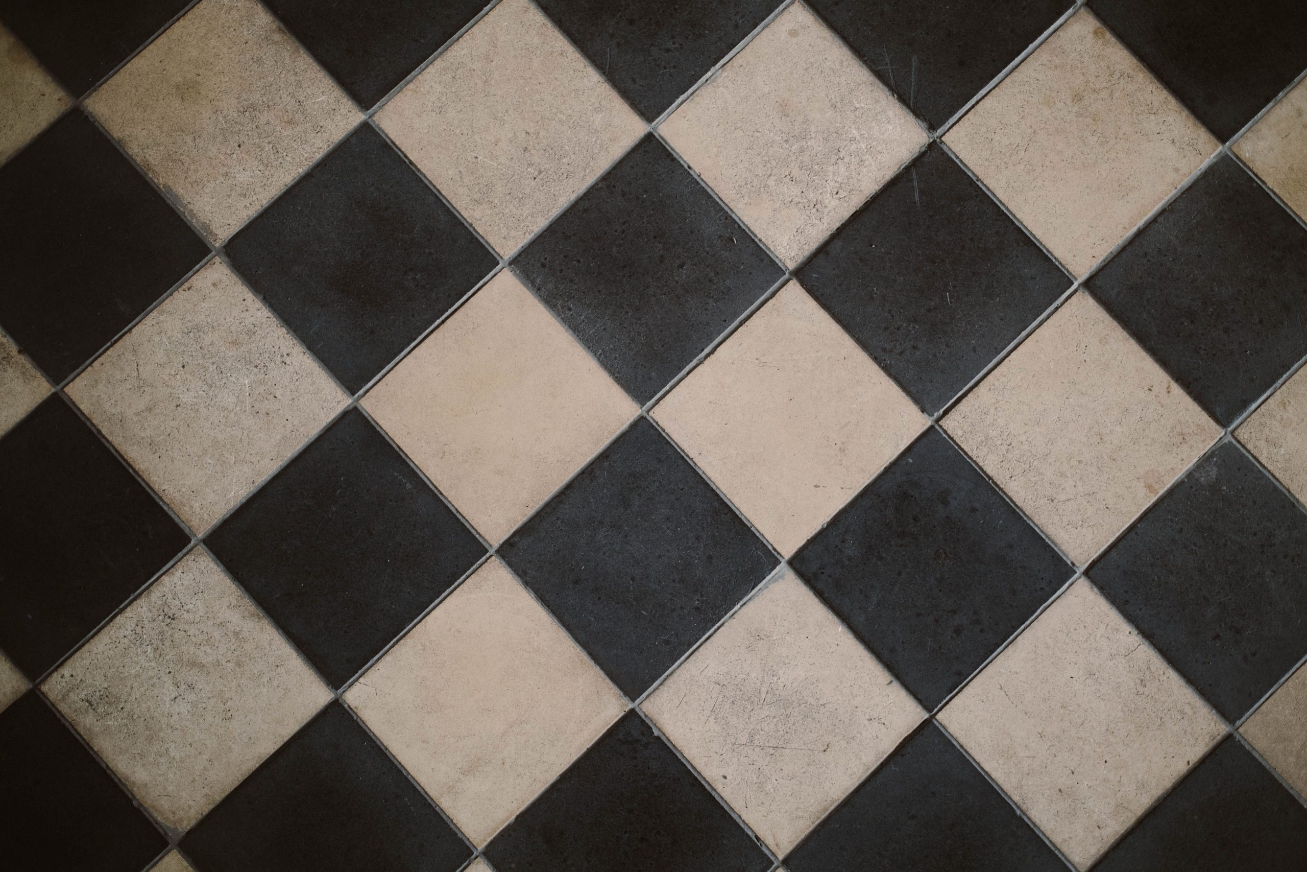 Diagonal black and white checkerboard tile flooring in a Tennessee entry